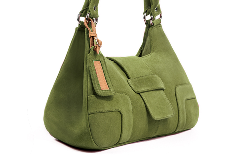 Handcrafted women's luxurious elegant handbag in premium pistachio green leather. Perfect for elevated everyday style.   
                Choose from our luxurious collections of leather and fabric to perfectly match your handbags to your outfits.